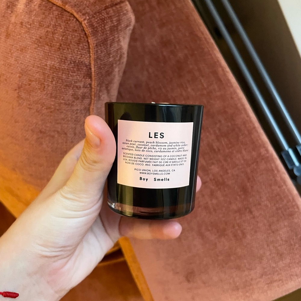 Boy smells LES votive